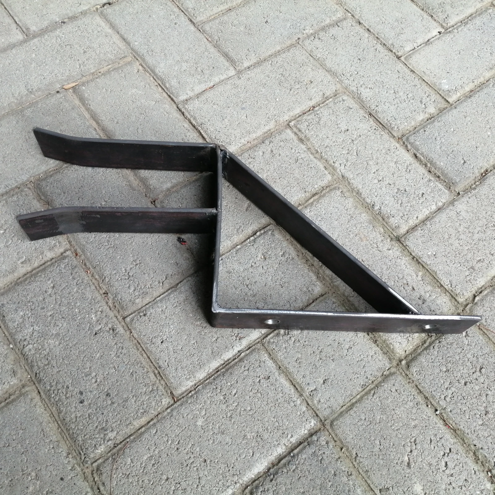 Catch bracket manufactured