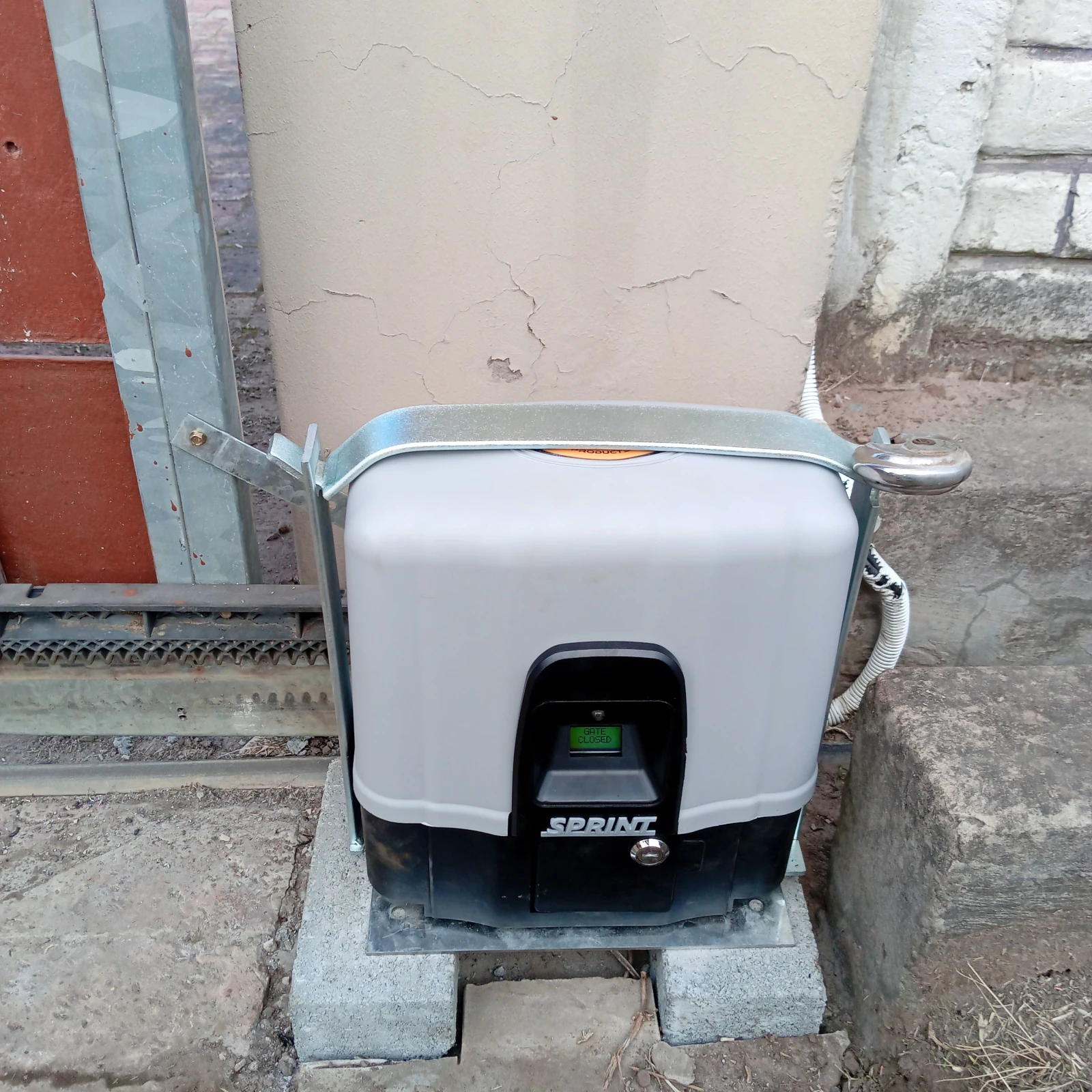 D.A.C.E. Sprint 500 sliding gate motor installed and raised off the ground